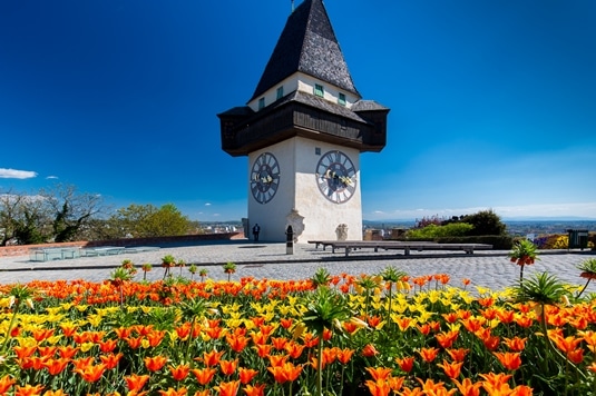 Der Grazer Uhrturm, das Wahrzeichen von Graz. Graz ist die Stadt in der der Kurs stattfindet.